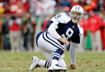 KANSAS CITY, MO - OCTOBER 11:  Quarterback Tony Romo #9 of the Dallas Cowboys gets up slowly after being hit during the game against the Kansas City Chiefs on October 11, 2009 at Arrowhead Stadiumin Kansas City, Missouri.  (Photo by Jamie Squire/Getty Images)