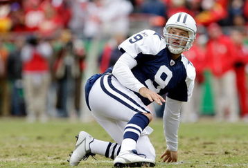 KANSAS CITY, MO - OCTOBER 11:  Quarterback Tony Romo #9 of the Dallas Cowboys gets up slowly after being hit during the game against the Kansas City Chiefs on October 11, 2009 at Arrowhead Stadiumin Kansas City, Missouri.  (Photo by Jamie Squire/Getty Images)