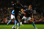 BIRMINGHAM, ENGLAND - OCTOBER 05:  Emmanuel Adebayor of Manchester City is challenged by Stiliyan Petrov of Aston Villa during the Barclays Premier League match between Aston Villa and Manchester City at Villa Park on October 5, 2009 in Birmingham, England.  (Photo by Clive Rose/Getty Images)