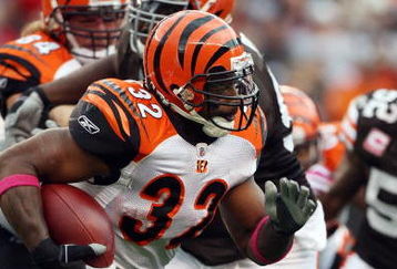 CLEVELAND - OCTOBER 04:  Cedric Benson #32 of the Cincinnati Bengals runs the ball against the Cleveland Browns during their game at Cleveland Browns Stadium on October 4, 2009 in Cleveland, Ohio. The Bengals defeated the Browns 23-20 in overtime.  (Photo by Jim McIsaac/Getty Images)