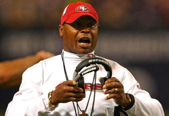 MINNEAPOLIS - SEPTEMBER 27: Head coach Mike Singletary of the San Francisco 49ers talks to a referee during a game against the Minnesota Vikings at the Hubert H. Humphrey Metrodome on September 27, 2009 in Minneapolis, Minnesota. The Vikings defeated the 49ers 27-24. (Photo by Jonathan Daniel/Getty Images)
