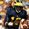 ANN ARBOR, MI - SEPTEMBER 19:  Quarterback Denard Robinson #16 of the Michigan Wolverines carries the ball on a 36 yard touchdown run in the fourth quarter against the Eastern Michigan Eagles at Michigan Stadium on September 19, 2009 in Ann Arbor, Michigan.  Michigan won 45-17.  (Photo by Stephen Dunn/Getty Images)