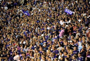 FORT WORTH, TX - OCTOBER 16:  Fans cheer for the TCU Horned Frogs during play against the BYU Cougars at Amon G. Carter Stadium on October 16, 2008 in Fort Worth, Texas.  (Photo by Ronald Martinez/Getty Images)