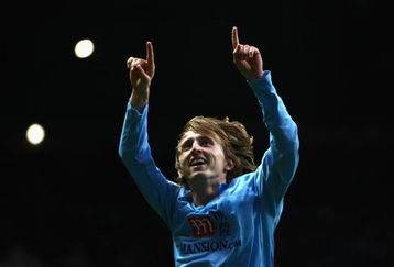 NEWCASTLE, UNITED KINGDOM - DECEMBER 21:  Luka Modric of Tottenham Hotspur celebrates scoring his team's first goal during the Barclays Premier League match between Newcastle United and Tottenham Hotspur at St James' Park on December 21, 2008 in Newcastle, England.  (Photo by Richard Heathcote/Getty Images)
