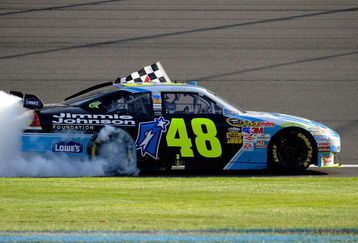 FONTANA, CA - OCTOBER 11:  Jimmie Johnson, driver of the #48 Lowe's Chevrolet, performs a burnout to celebrate winning the NASCAR Sprint Cup Series Pepsi 500 at Auto Club Speedway on October 11, 2009 in Fontana, California.  (Photo by Rusty Jarrett/Getty Images for NASCAR)