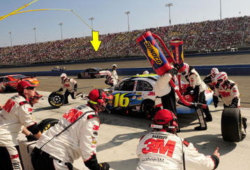 FONTANA, CA - OCTOBER 11:  Greg Biffle, driver of the #16 3M/Scotch Blue Ford, comes in for a pit stop during the NASCAR Sprint Cup Series Pepsi 500 at Auto Club Speedway on October 11, 2009 in Fontana, California.  (Photo by Rusty Jarrett/Getty Images for NASCAR)