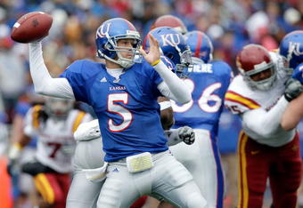 LAWRENCE, KS - OCTOBER 10:  Quarterback Todd Reesing #5 of the Kansas Jayhawks passes during the game against the Iowa State Cyclones on October 10, 2009 at Memorial Stadium in Lawrence, Kansas.  (Photo by Jamie Squire/Getty Images)