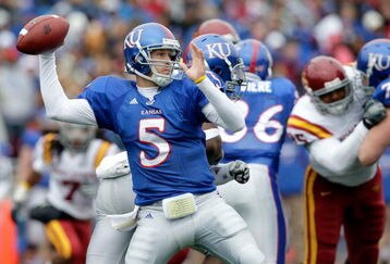 LAWRENCE, KS - OCTOBER 10:  Quarterback Todd Reesing #5 of the Kansas Jayhawks passes during the game against the Iowa State Cyclones on October 10, 2009 at Memorial Stadium in Lawrence, Kansas.  (Photo by Jamie Squire/Getty Images)