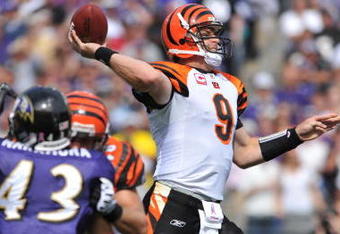 BALTIMORE - OCTOBER 11:  Carson Palmer #9 of the Cincinnati Bengals looks passes against the Baltimore Ravens at M&T Bank Stadium on October 11, 2009 in Baltimore, Maryland. The Bengals defeated the Ravens 17-14. (Photo by Larry French/Getty Images)