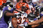 BALTIMORE - OCTOBER 11:  Cedric Benson #32 of the Cincinnati Bengals runs the ball in for a touchdown against the Baltimore Ravens at M&T Bank Stadium on October 11, 2009 in Baltimore, Maryland. The Bengals defeated the Ravens 17-14. (Photo by Larry French/Getty Images)