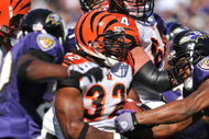 BALTIMORE - OCTOBER 11:  Cedric Benson #32 of the Cincinnati Bengals runs the ball in for a touchdown against the Baltimore Ravens at M&T Bank Stadium on October 11, 2009 in Baltimore, Maryland. The Bengals defeated the Ravens 17-14. (Photo by Larry French/Getty Images)