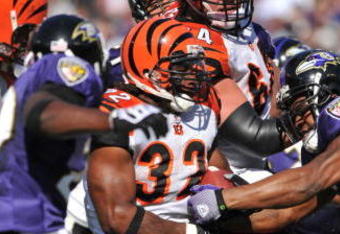 BALTIMORE - OCTOBER 11:  Cedric Benson #32 of the Cincinnati Bengals runs the ball in for a touchdown against the Baltimore Ravens at M&T Bank Stadium on October 11, 2009 in Baltimore, Maryland. The Bengals defeated the Ravens 17-14. (Photo by Larry French/Getty Images)