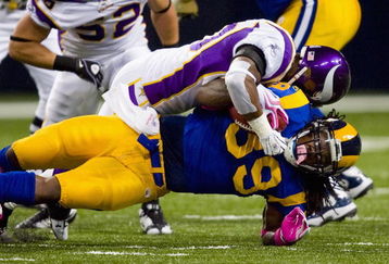ST. LOUIS, MO - OCTOBER 11: Steven Jackson #39 of the St. Louis Rams is tackled against the Minnesota Vikings at the Edward Jones Dome on October 11, 2009 in St. Louis, Missouri.  (Photo by Dilip Vishwanat/Getty Images)