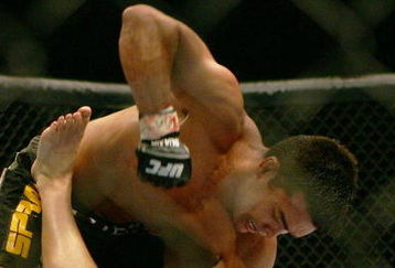 MANCHESTER, UNITED KINGDOM - APRIL 21: Lyoto Machida of Brazil and David Heath of England in action during a Welterweight bout of the Ultimate Fighting Championship at the Manchester Evening News Arena on April 21, 2007 in Manchester, England. (Photo by Gary M. Prior/Getty Images).