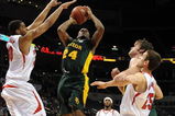 OKLAHOMA CITY - MARCH 11: Guard LaceDarius Dunn #24 of the Baylor Bears takes a shot against Toney McCray #30 of the Nebraska Cornhuskers during the Phillips 66 Big 12 Men's Basketball Championship at the Ford Center March 11, 2009 in Oklahoma City, Oklahoma.  (Photo by Ronald Martinez/Getty Images)