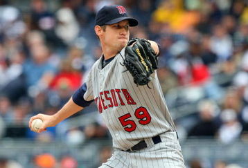 NEW YORK - MAY 17:  Kevin Slowey #59 of the Minnesota Twins pitches against the New York Yankees on May 17, 2009 at Yankee Stadium in the Bronx borough of New York City. The Yankees defeated the Twins 3-2 in ten innings.  (Photo by Jim McIsaac/Getty Images)