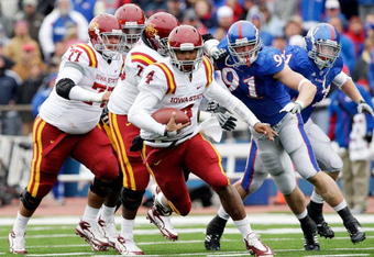 LAWRENCE, KS - OCTOBER 10:  Quarterback Austen Arnaud #4 of the Iowa State Cyclones scrambles during the game against the Kansas Jayhawks on October 10, 2009 at Memorial Stadium in Lawrence, Kansas.  (Photo by Jamie Squire/Getty Images)