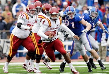 LAWRENCE, KS - OCTOBER 10:  Quarterback Austen Arnaud #4 of the Iowa State Cyclones scrambles during the game against the Kansas Jayhawks on October 10, 2009 at Memorial Stadium in Lawrence, Kansas.  (Photo by Jamie Squire/Getty Images)