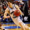 PHILADELPHIA - MARCH 19: Jimmer Fredette #32 of the Brigham Young Cougars drives against Dash Harris #5 of the Texas A&M Aggies during the first round of the NCAA Division I Men's Basketball Tournament at the Wachovia Center on March 19, 2009 in Philadelphia, Pennsylvania. (Photo by Jim McIsaac/Getty Images)