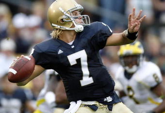 SOUTH BEND, IN - SEPTEMBER 13:  Jimmy Clausen #7 of the Notre Dame Fighting Irish throws a first quarter pass while playing the Michigan Wolverines on September 13, 2008 at Notre Dame Stadium in South Bend, Indiana. Notre Dame won the game 35-17.  (Photo by Gregory Shamus/Getty Images)