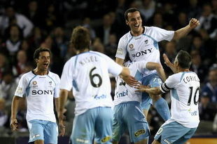 MELBOURNE, AUSTRALIA - OCTOBER 09: Sydney FC players celebrate a goal by Mark Bridge during the round ten A-League match between the Melbourne Victory and Sydney FC at Etihad Stadium on October 9, 2009 in Melbourne, Australia. (Photo by Quinn Rooney/Getty Images)
