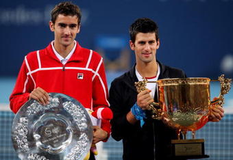 BEIJING - OCTOBER 11:  Winner Novak Djokovic of Serbia (R) and Marin Cilic of Croatia pose with their trophies after the men's final match during day ten of the 2009 China Open at the National Tennis Centre on October 11, 2009 in Beijing, China. Novak Djokovic of Serbia wins the tournament.  (Photo by Feng Li/Getty Images)