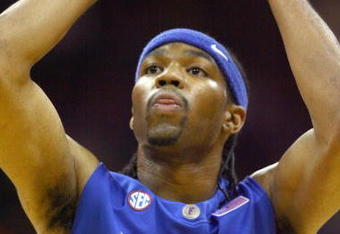 KANSAS CITY, MO - NOVEMBER 25:  Alex Tyus #23 of the Florida Gators looks to move the ball against the Washington Huskies during the CBE Classic consolation game on November 25, 2008 at the Sprint Center in Kansas City, Missouri. (Photo by: Jamie Squire/Getty Images)