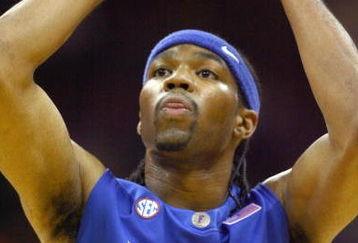 KANSAS CITY, MO - NOVEMBER 25:  Alex Tyus #23 of the Florida Gators looks to move the ball against the Washington Huskies during the CBE Classic consolation game on November 25, 2008 at the Sprint Center in Kansas City, Missouri. (Photo by: Jamie Squire/Getty Images)