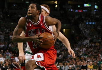 BOSTON - MAY 02:  John Salmons #15 of the Chicago Bulls heads to the net as Brian Scalabrine #44 of the Boston Celtics defends in Game Seven of the Eastern Conference Quarterfinals during the 2009 NBA Playoffs at TD Banknorth Garden on May 2, 2009 in Boston, Massachusetts. The Celtics defeated the Bulls 109-99. NOTE TO USER: User expressly acknowledges and agrees that, by downloading and or using this photograph, User is consenting to the terms and conditions of the Getty Images License Agreement.  (Photo by Elsa/Getty Images)