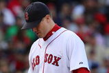 BOSTON - OCTOBER 11:  Pitcher Jonathan Papelbon #58 of the Boston Red Sox reacts after allowing three runs in the ninth inning to blow the save against the Los Angeles Angels of Anaheim in Game Three of the ALDS during the 2009 MLB Playoffs at Fenway Park on October 11, 2009 in Boston,  Massachusetts. (Photo by Jim Rogash/Getty Images)