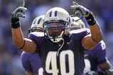 SEATTLE - SEPTEMBER 6:  Mason Foster #40 of the Washington Huskies signals to the sideline during their game against the BYU Cougars on September 6, 2008 at Husky Stadium in Seattle, Washington. The Cougars defeated the Huskies 28-27. (Photo by Otto Greule Jr/Getty Images)