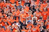 STILLWATER, OK - SEPTEMBER 05:  Fans of the Oklahoma State Cowboys cheers during the college football game against the Georgia Bulldogs at Boone Pickens Stadium on September 5, 2009 in Stillwater, Oklahoma.  The Cowboys defeated the Bulldogs 24-10.  (Photo by Christian Petersen/Getty Images)
