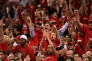ST. LOUIS - MARCH 23: UNLV fans cheer as they take on the Oregon Ducks during the midwest regionals of the NCAA Men's Basketball Tournament at the Edward Jones Dome on March 23, 2007 in St. Louis, Missouri. (Photo by Travis Lindquist/Getty Images)