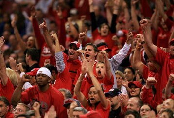 ST. LOUIS - MARCH 23:  UNLV fans cheer as they take on the Oregon Ducks during the midwest regionals of the NCAA Men's Basketball Tournament at the Edward Jones Dome on March 23, 2007 in St. Louis, Missouri.  (Photo by Travis Lindquist/Getty Images)