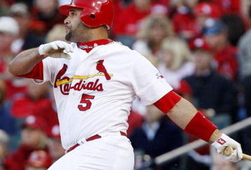 ST. LOUIS, MO - OCTOBER 10:  Albert Pujols #5 of the St. Louis Cardinals hits a single against the Los Angeles Dodgers in the first inning of Game Three of the NLDS during the 2009 MLB Playoffs at Busch Stadium on October 10, 2009 in St. Louis, Missouri. (Photo by Ronald Martinez/Getty Images)