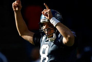 SEATTLE, WA - OCTOBER 11:  Quarterback Matt Hasselbeck #8 of the Seattle Seahawks celebrates a touchdown pass in te second quarter against the Jacksonville Jaguars at Qwest Field on October 11, 2009 in Seattle, Washington.  (Photo by Jonathan Ferrey/Getty Images)