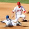 ANAHEIM, CA - OCTOBER 01: Julio Borbon #29 of the Texas Rangers slides safely into second base with a double as the ball gets away from Brandon Wood #3 of the Los Angeles Angels of Anaheim in the fifth inning at Angel Stadium on October 1, 2009 in Anaheim, California. The Rangers defeated the Angels 11-3. (Photo by Jeff Gross/Getty Images)