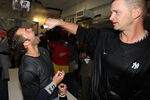 MINNEAPOLIS - OCTOBER 11: A.J. Burnett (R) of the New York Yankees pours champagne into the mouth of Nick Swisher after a win over the Minnesota Twins in Game Three of the ALDS during the 2009 MLB Playoffs at the Hubert H. Humphrey Metrodome on October 11, 2009 in Minneapolis, Minnesota. (Photo by Jonathan Daniel/Getty Images)