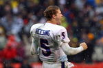 KANSAS CITY, MO - NOVEMBER 29:  Quarterback Todd Reesing #5 of the Kansas Jayhawks celebrates after  a touchdown during the final minutes of the game against the Missouri Tigers on November 29, 2008 at Arrowhead Stadium in Kansas City, Missouri.  (Photo by Jamie Squire/Getty Images)