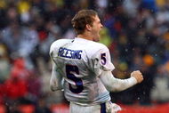 KANSAS CITY, MO - NOVEMBER 29: Quarterback Todd Reesing #5 of the Kansas Jayhawks celebrates after a touchdown during the final minutes of the game against the Missouri Tigers on November 29, 2008 at Arrowhead Stadium in Kansas City, Missouri. (Photo by Jamie Squire/Getty Images)