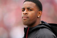 SAN FRANCISCO - OCTOBER 11:  Michael Crabtree, the San Francisco 49ers first round draft pick, watches the 49ers game against the Atlanta Falcons on the sidelines at Candlestick Park on October 11, 2009 in San Francisco, California.  (Photo by Ezra Shaw/Getty Images)
