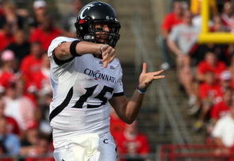PISCATAWAY, NJ - SEPTEMBER 07:  Tony Pike #15 of the Cincinnati Bearcats throws a pass against the Rutgers Scarlet Knights at Rutgers Stadium on September 7, 2009 in Piscataway, New Jersey.  (Photo by Jim McIsaac/Getty Images)