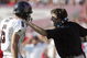 COLLEGE STATION, TX -SEPTEMBER 30: Quarterback Graham Harrell #6 of the Texas Tech Red Raiders talks with head coach Mike Leach during play against the Texas A&M Aggies at Kyle Field on September 30, 2006 in College Station, Texas. (Photo by Ronald Martinez/Getty Images)