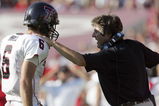 COLLEGE STATION, TX -SEPTEMBER 30:  Quarterback Graham Harrell #6 of the Texas Tech Red Raiders talks with head coach Mike Leach during play against the Texas A&M Aggies at Kyle Field on September 30, 2006 in College Station, Texas.  (Photo by Ronald Martinez/Getty Images)