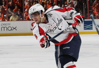 PHILADELPHIA - OCTOBER 06: Alex Ovechkin #8 of the Washington Capitals breaks his stick on a slap shot against the Phildelphia Flyers at the Wachovia Center on October 6, 2009 in Philadelphia, Pennsylvania.  (Photo by Bruce Bennett/Getty Images)