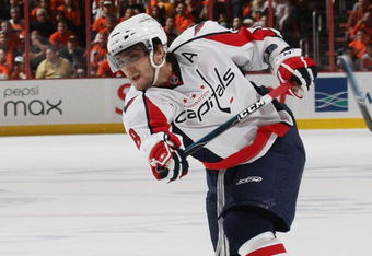 PHILADELPHIA - OCTOBER 06: Alex Ovechkin #8 of the Washington Capitals breaks his stick on a slap shot against the Phildelphia Flyers at the Wachovia Center on October 6, 2009 in Philadelphia, Pennsylvania.  (Photo by Bruce Bennett/Getty Images)