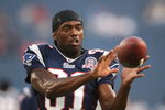 FOXBORO, MA - AUGUST 20:  Randy Moss #81 of the New England Patriots catches a pass during warm ups against the Cincinnati Bengals during their preseason game at Gillette Stadium on August 20, 2009 in Foxboro, Massachusetts.  (Photo by Jim Rogash/Getty Images)