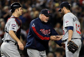 NEW YORK - OCTOBER 09:  Manager Ron Gardenhire pulls pitcher Nick Blackburn #53 of the Minnesota Twins out of the game in the sixthing inning against the New York Yankees in Game Two of the ALDS during the 2009 MLB Playoffs at Yankee Stadium on October 9, 2009 in the Bronx borough of New York City.  (Photo by Nick Laham/Getty Images)