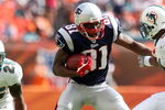 MIAMI - NOVEMBER 23:  Wide receiver Randy Moss #81 of the New England Patriots looks for room to run while taking on the Miami Dolphins at Dolphin Stadium on November 23, 2008 in Miami, Florida. The Patriots defeated the Dolphins 48-28.  (Photo by Doug Benc/Getty Images)