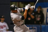 MINNEAPOLIS - OCTOBER 11: Alex Rodriguez #13 of the New York Yankees hits a solo home run in the 7th inning against the Minnesota Twins in Game Three of the ALDS during the 2009 MLB Playoffs at the Hubert H. Humphrey Metrodome on October 11, 2009 in Minneapolis, Minnesota. (Photo by Jonathan Daniel/Getty Images)